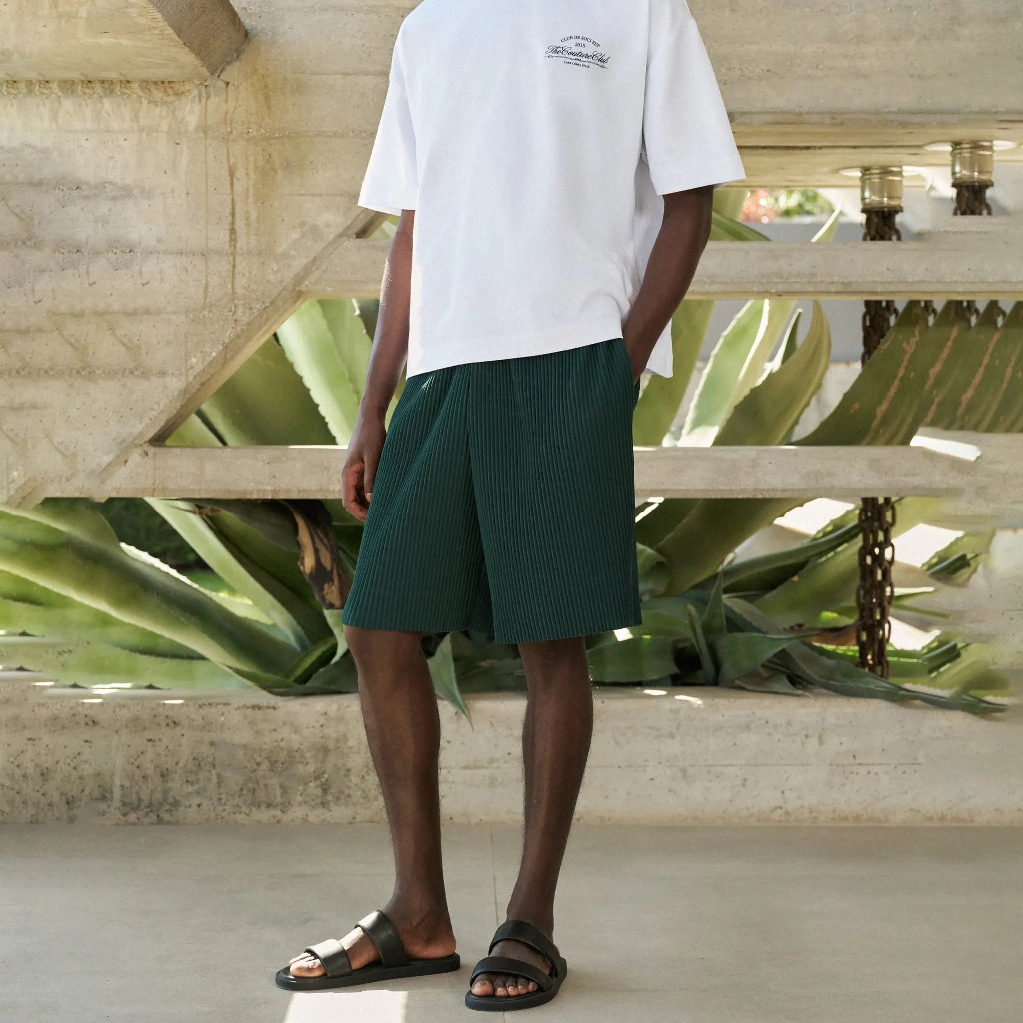 Front Side View of The Couture Club Plisse Forest Green Shorts